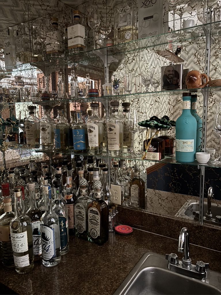 Tequila collection on shelves